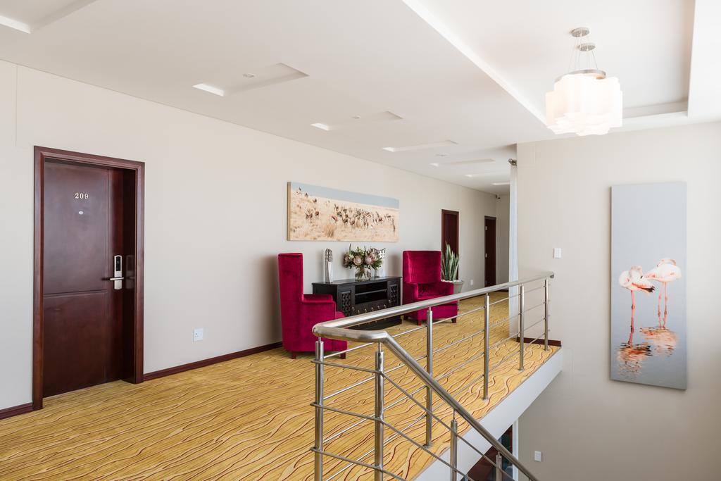 Flamingo Villas Boutique Hotel Уолфиш-Бей Экстерьер фото